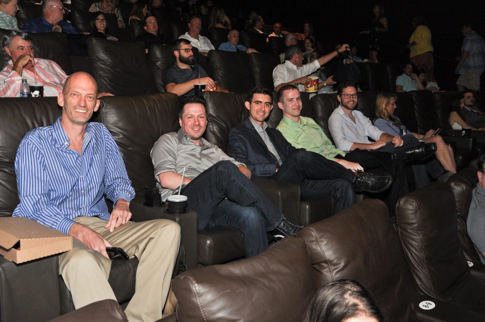 Friends in the theater seats at the Sanctuary premiere